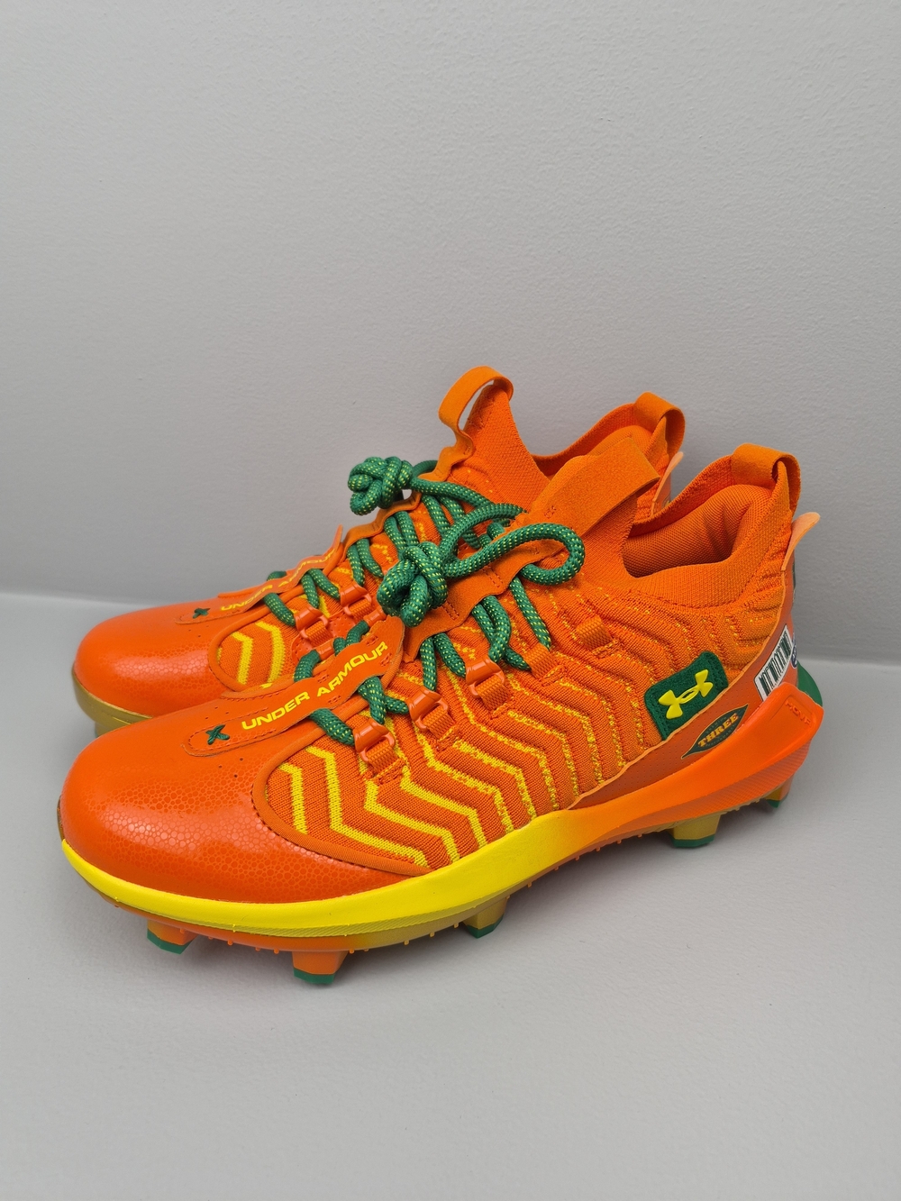New Under Armour Orange Yellow Baseball Cleats Men's size 9.5